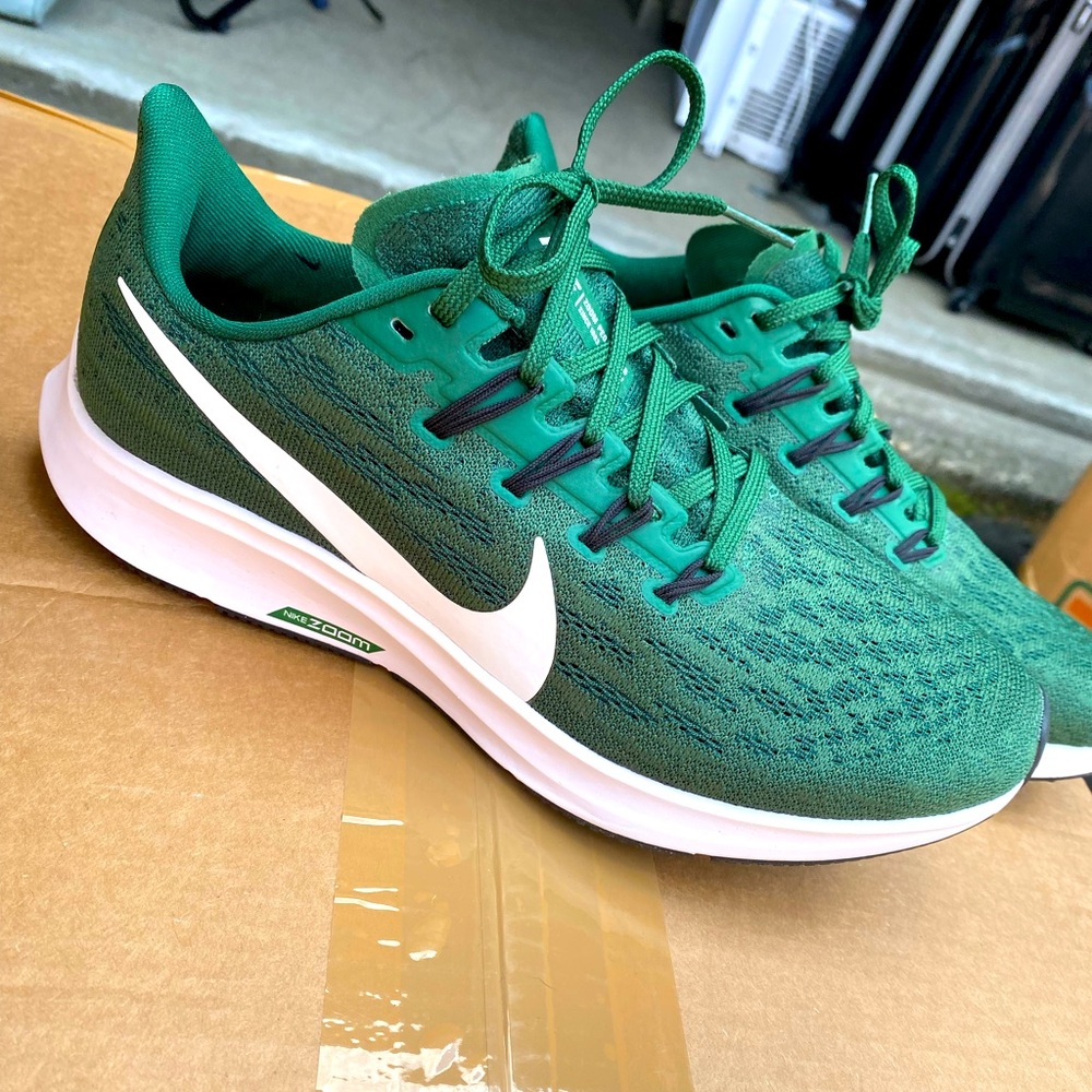 Green Nike Pegasus zoom sneakers